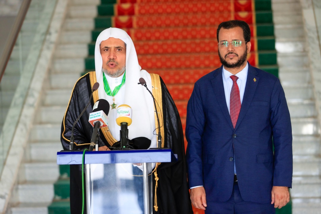 His Excellency the President of the Islamic Republic of Mauritania, Mohamed Ould Cheikh Ghazouani, awards His Excellency Sheikh Dr. Mohammed Al-Issa the medal of Commander of the National Order of Merit