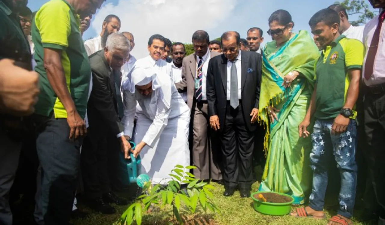  HE Dr. Mohammad Alissa participated in a tree planting while visiting Sri Lanka this summer