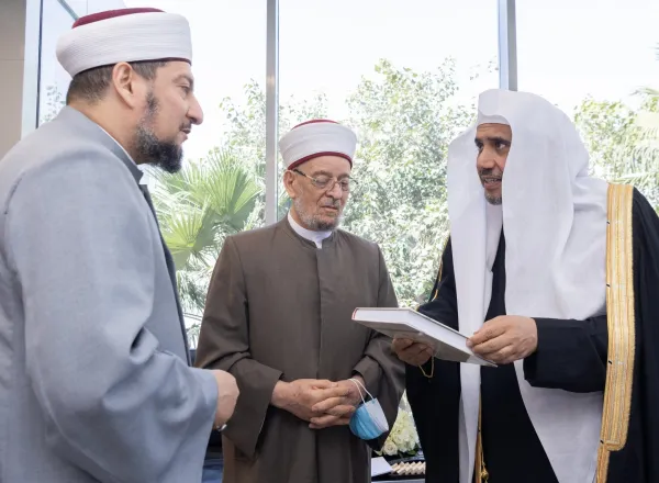 H.E. Dr. Mohammad Alissa receives His Eminence Dr. Ahmed Al-Taha, head of the Iraqi Fiqh Council